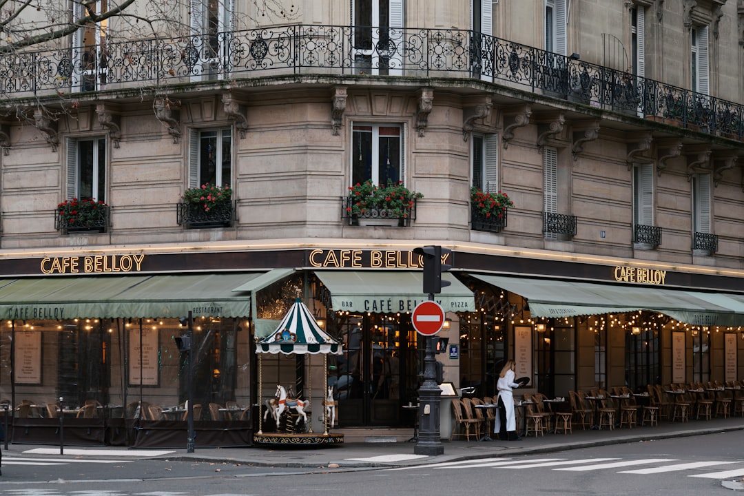 A street corner with a cafe on the corner