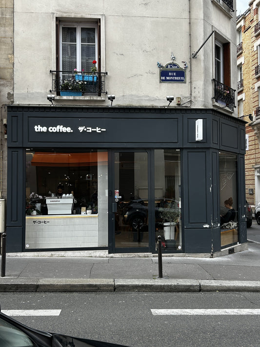 Devanture noire de The Coffee, 10 Rue Gonnet à Paris 11e
